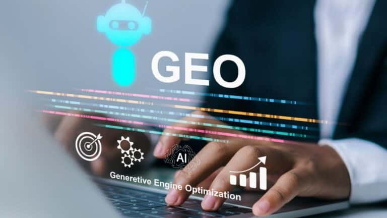 Hands typing on a laptop with 'GEO' and icons representing optimization and AI.