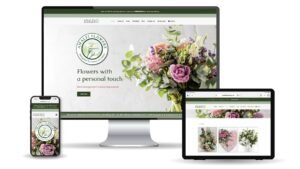 A responsive website display featuring floral arrangements and the text 'Flowers with a personal touch'.