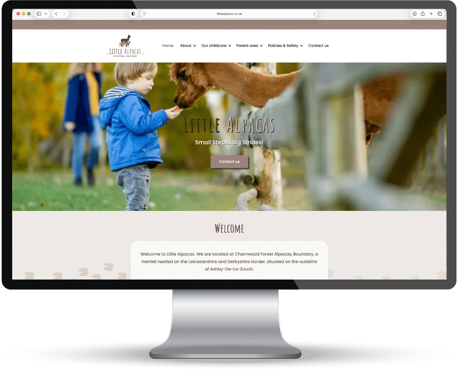 Little Alpacas website with a child interacting with an alpaca.